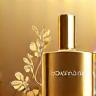 A golden icon depicting a droplet and floral elements, symbolizing bespoke fragrance creation.