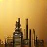 A golden icon showing a stylized factory building, representing perfume manufacturing capabilities.